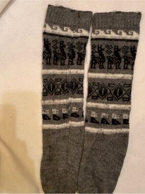 Hand knit alpaca wool for indoor slipper socks in grey, black and white.